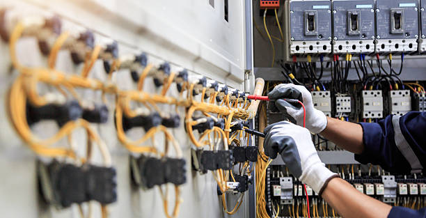 Professional Electrician technician working in Hedwig Village, TX